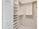 Walk-in closet with shelving and hanging rods at 1950 Windward Oaks Ct, Kissimmee, FL 34746