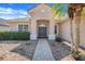 Charming home with a welcoming front entrance, featuring a well-kept lawn and beautiful shrubbery at 1950 Windward Oaks Ct, Kissimmee, FL 34746