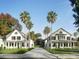 Charming two-story homes with symmetrical design, inviting front porches and lush landscaping at 1987 Peel Ave, Orlando, FL 32806