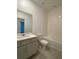 Bright bathroom with a single sink vanity and a shower-tub combination at 2668 Spider Lily Ct, Clermont, FL 34711