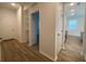 Hallway that leads to the kitchen and bedrooms at 2668 Spider Lily Ct, Clermont, FL 34711