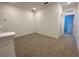 Neutral loft space featuring recessed lighting and carpeted flooring at 2668 Spider Lily Ct, Clermont, FL 34711