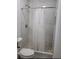 Bathroom featuring a tiled shower, new shower head and mosaic tile floor at 272 Loma Bonita Dr, Davenport, FL 33837