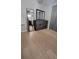 Bedroom featuring wooden floors, fan, dresser with vanity mirror, and closet at 272 Loma Bonita Dr, Davenport, FL 33837