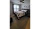 Bedroom featuring ceiling fan, and light-colored laminate flooring at 272 Loma Bonita Dr, Davenport, FL 33837