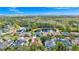 Aerial view of home near a pond featuring a beautiful landscape and serene water views at 2932 Bayhead Run, Oviedo, FL 32765