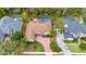 Beautiful aerial view of the home featuring a private pool and lush greenery at 2932 Bayhead Run, Oviedo, FL 32765