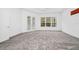 Spacious bedroom featuring carpeted floors, ceiling fan, and lots of natural light at 2932 Bayhead Run, Oviedo, FL 32765
