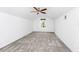 An empty bedroom with gray carpet, white walls, and a ceiling fan at 2932 Bayhead Run, Oviedo, FL 32765