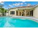 A screened-in swimming pool and patio offers outdoor enjoyment at 2932 Bayhead Run, Oviedo, FL 32765