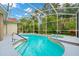 A screened-in swimming pool and patio offer private outdoor enjoyment at 2932 Bayhead Run, Oviedo, FL 32765