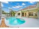 A screened-in swimming pool and patio offer outdoor enjoyment at 2932 Bayhead Run, Oviedo, FL 32765