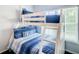 Up close view of the bunk beds and a window in a bedroom at 3002 Bonfire Beach Dr # 202, Kissimmee, FL 34746