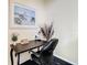 Home office setup includes a modern desk, ergonomic chair, and decorative accents at 3002 Bonfire Beach Dr # 202, Kissimmee, FL 34746