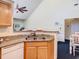 Kitchen sink with granite countertops and ample cabinet space at 3002 Bonfire Beach Dr # 202, Kissimmee, FL 34746