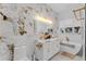 Luxurious bathroom showcasing a soaking tub, a sleek vanity, and upscale marble tiling at 3007 E Central Blvd # 3007, Orlando, FL 32803