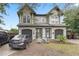 Charming townhouse with a well-manicured lawn and two-car garage at 3007 E Central Blvd # 3007, Orlando, FL 32803