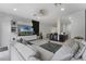 Bright living room featuring a large TV and a comfortable sectional at 3007 E Central Blvd # 3007, Orlando, FL 32803