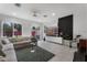 Cozy living room with a large sectional sofa and sleek entertainment center at 3007 E Central Blvd # 3007, Orlando, FL 32803