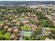Bird's eye view showing the layout of the community including the tennis courts, community pool, and landscaping at 305 Lakepointe Dr # 103, Altamonte Springs, FL 32701