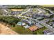 Aerial view of the community showcasing the community pool, playground, and surrounding homes at 3186 Sailing Pier Ave, Winter Garden, FL 34787