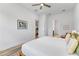 Bright bedroom featuring a ceiling fan, ensuite bathroom and a walk-in closet at 3186 Sailing Pier Ave, Winter Garden, FL 34787