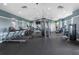 Community gym featuring modern equipment and ample space for a full workout at 3186 Sailing Pier Ave, Winter Garden, FL 34787