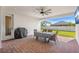 Covered back patio with brick flooring, outdoor furniture, and a grill at 3351 Pine Timber Pt, Oviedo, FL 32765
