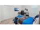 Bedroom area featuring a game-themed comforter, TV, and desk area at 3351 Pine Timber Pt, Oviedo, FL 32765