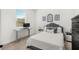 Bedroom with grey accents, white walls, and a comfortable space at 3351 Pine Timber Pt, Oviedo, FL 32765