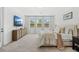 Bright primary bedroom with large windows and plenty of room at 3351 Pine Timber Pt, Oviedo, FL 32765