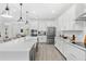 Bright kitchen featuring ample counter space, stainless steel appliances, and open concept design at 3351 Pine Timber Pt, Oviedo, FL 32765
