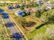 Aerial view of the neighborhood featuring a spacious vacant lot at 34000 Fortunado St, Sorrento, FL 32776