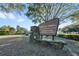 Elegant community sign welcomes residents to Sorrento Springs with a focus on swimming, tennis, and fitness at 34000 Fortunado St, Sorrento, FL 32776
