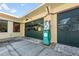 The spacious garage includes an antique style gas pump, vintage lighting, and plenty of room for storage at 34000 Fortunado St, Sorrento, FL 32776