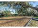 Community playground with swings, slides, and climbing structure set on wood mulch, perfect for Gathering fun at 34000 Fortunado St, Sorrento, FL 32776