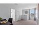 Bonus room or loft space with natural light, desk, and comfortable seating area at 3615 Salvia Ct, Tavares, FL 32778