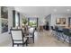 Spacious dining room seamlessly connects to the kitchen and living area at 3615 Salvia Ct, Tavares, FL 32778
