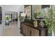 View of foyer with decor, leading to dining and living spaces at 3615 Salvia Ct, Tavares, FL 32778