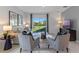 The living room features a sliding glass door leading to a well-maintained backyard, and neutral furniture at 3615 Salvia Ct, Tavares, FL 32778