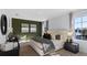 Stylish main bedroom with a serene atmosphere and neutral decor, offering a relaxing retreat at 3615 Salvia Ct, Tavares, FL 32778