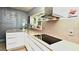 Bright kitchen featuring modern appliances, plenty of counter space, and natural light at 3714 Virginia Dr, Orlando, FL 32803