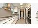 Sleek, modern kitchen with stainless steel appliances and ample counter space at 3714 Virginia Dr, Orlando, FL 32803