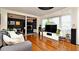 Cozy living room featuring hardwood floors, comfortable seating and an open-concept layout at 3714 Virginia Dr, Orlando, FL 32803