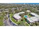 Aerial view of community with pool, parking and access to the ocean at 3800 Saxon Dr # 19B, New Smyrna Beach, FL 32169