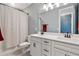 Clean bathroom features a double sink vanity with a shower and tub combination at 4210 Sunset Preserve Blvd, Orlando, FL 32820