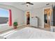 Clean bedroom featuring a window, closet, and dresser, perfect for relaxation or study at 4210 Sunset Preserve Blvd, Orlando, FL 32820