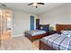 Shared bedroom features ceiling fan and carpeted floor at 4210 Sunset Preserve Blvd, Orlando, FL 32820