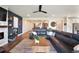 Open-concept living room leading to the kitchen at 4210 Sunset Preserve Blvd, Orlando, FL 32820