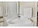 Bathroom features a garden tub with tile surround at 442 Devon Pl, Lake Mary, FL 32746